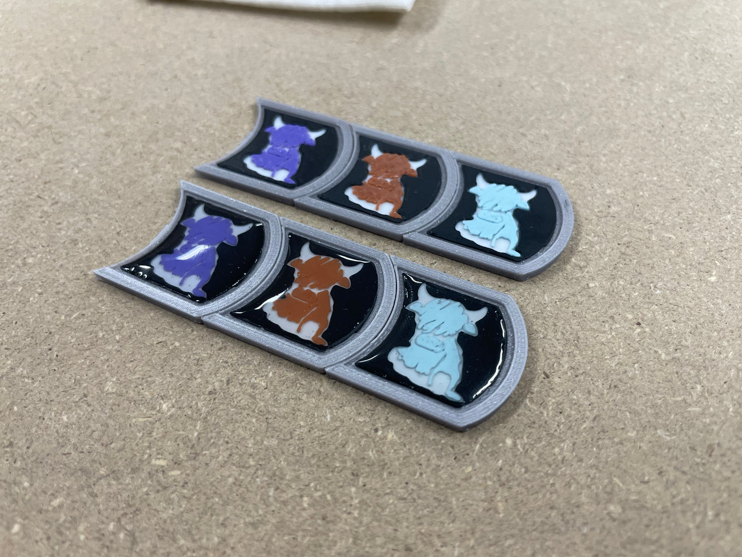 Highland calf ownership badges, MOO MOO