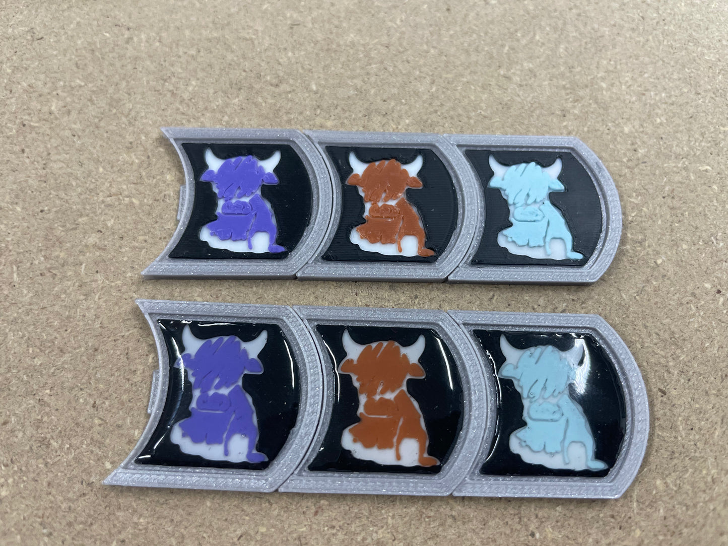 Highland calf ownership badges, MOO MOO
