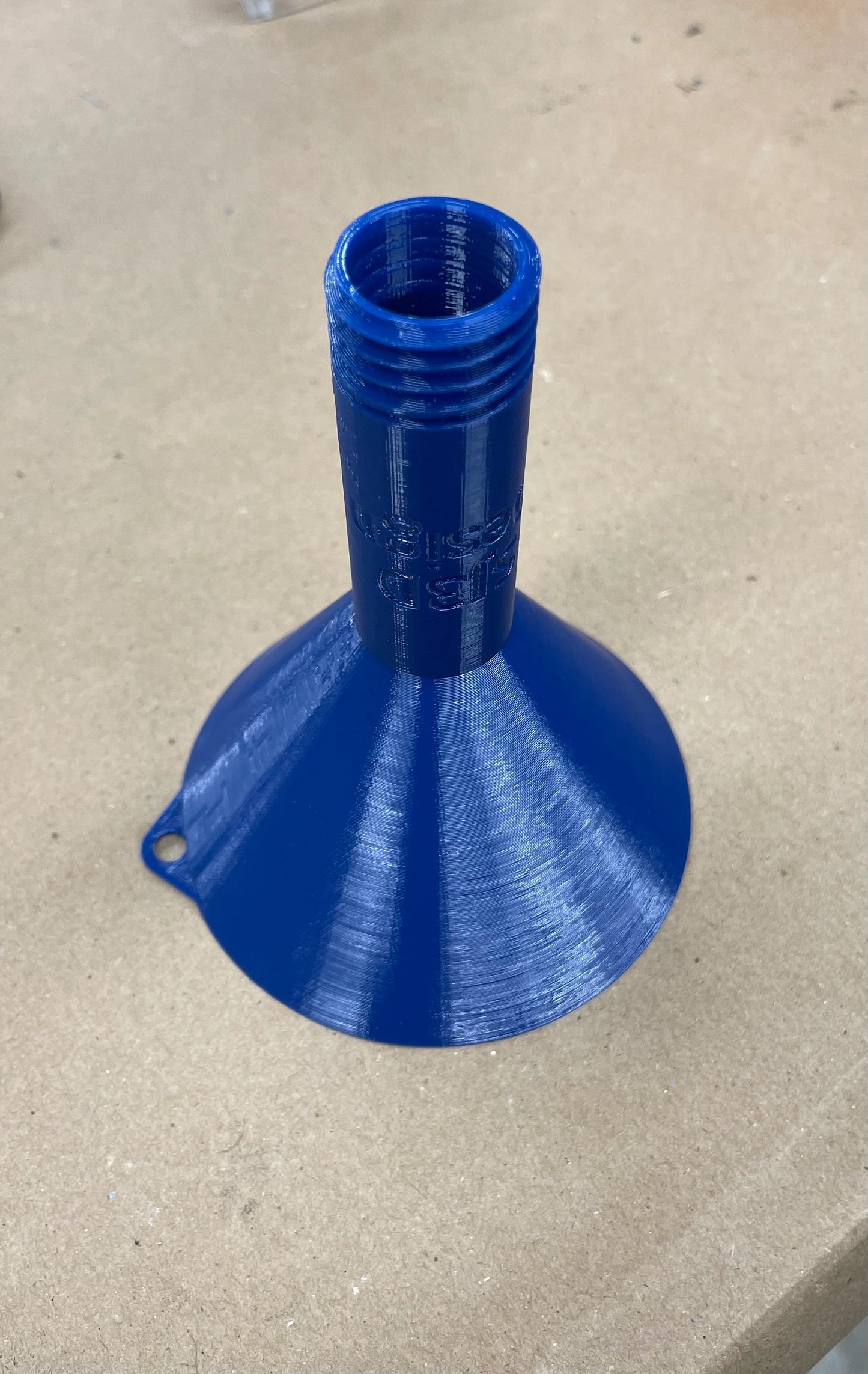 Flexible threaded oil funnel