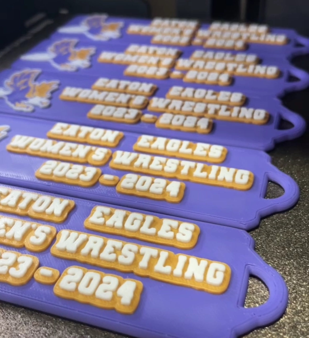 Custom Awards, Trophies, Keychains and Bag Tags.