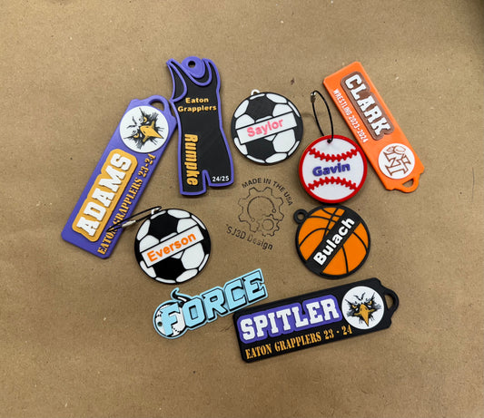 Custom Awards, Trophies, Keychains and Bag Tags.